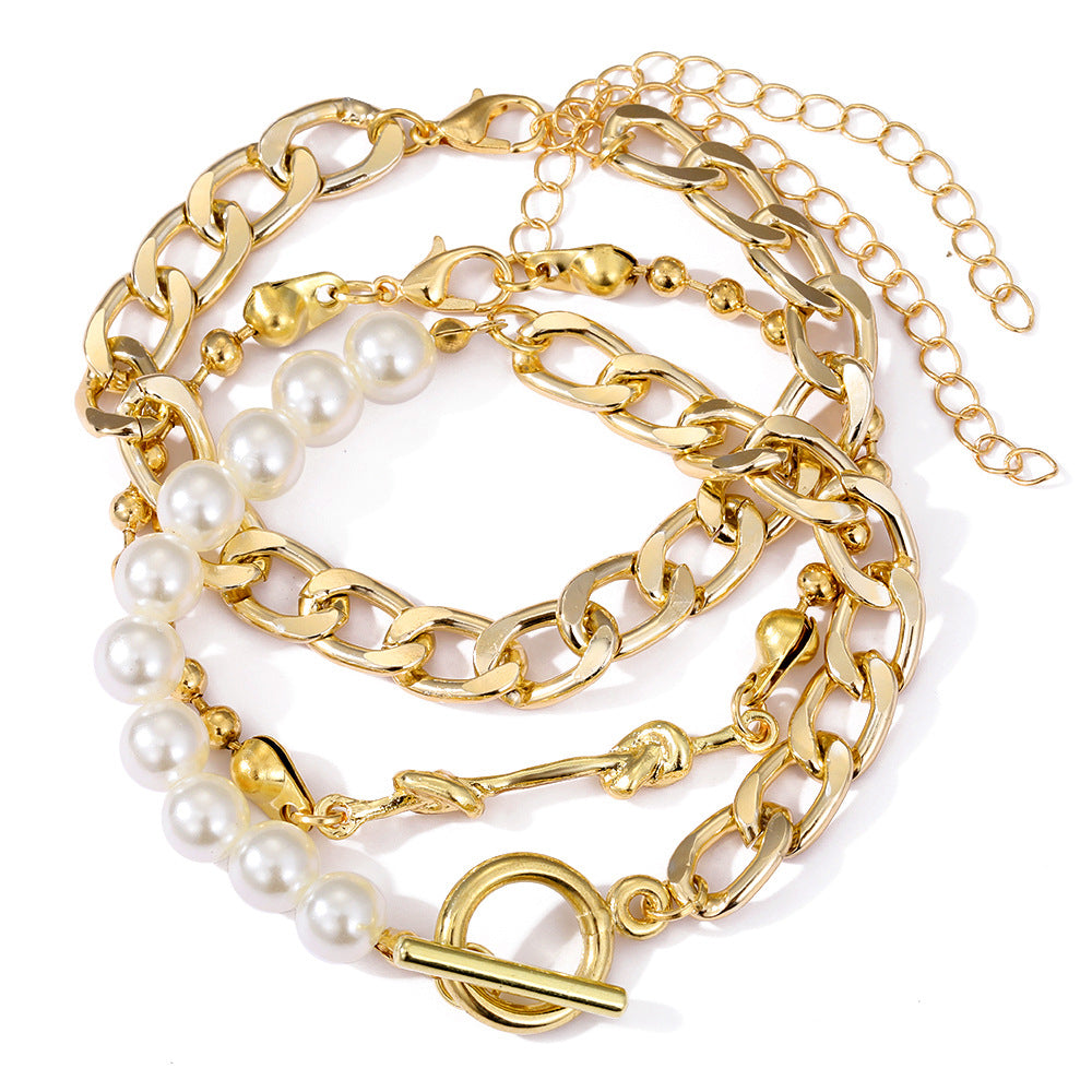 Creative Heart Pearl Multi-layer Chain OT Bracelet Suit Product information: Treatment Process: Electroplating Color: HS533-1,HS533-2,HS533-3,HS533-4 Applicable people: Unisex Applicable occasions for gifts: Employee Benefits Material: Alloy Shape: Star P