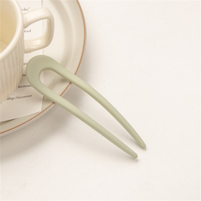 Fashion Candy Color Hair Sticks for Women Elevate your hair game with our Fashion Candy Color Hair Sticks for Women. These Simple Hair Clip Pins come in a variety of vibrant candy colors, adding a playful touch to your hairstyles. Crafted with a minimalis