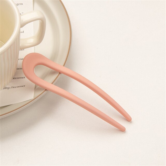 Fashion Candy Color Hair Sticks for Women Elevate your hair game with our Fashion Candy Color Hair Sticks for Women. These Simple Hair Clip Pins come in a variety of vibrant candy colors, adding a playful touch to your hairstyles. Crafted with a minimalis