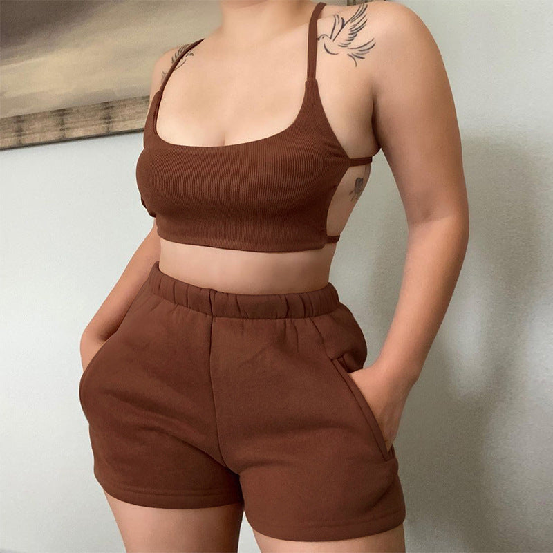Naked Back Slim Vest Fashion Casual Shorts Sports Suit Product information: style: Casual pattern: plain Style: Two-piece suit Top style: vest Top sleeve length: sleeveless Popular elements: backless Fabric name: Polyester Main fabric composition: polyest