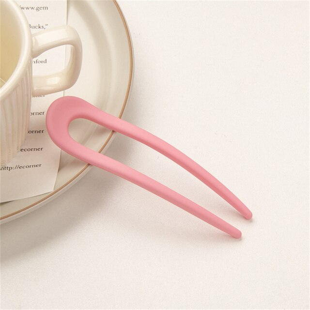 Fashion Candy Color Hair Sticks for Women Elevate your hair game with our Fashion Candy Color Hair Sticks for Women. These Simple Hair Clip Pins come in a variety of vibrant candy colors, adding a playful touch to your hairstyles. Crafted with a minimalis