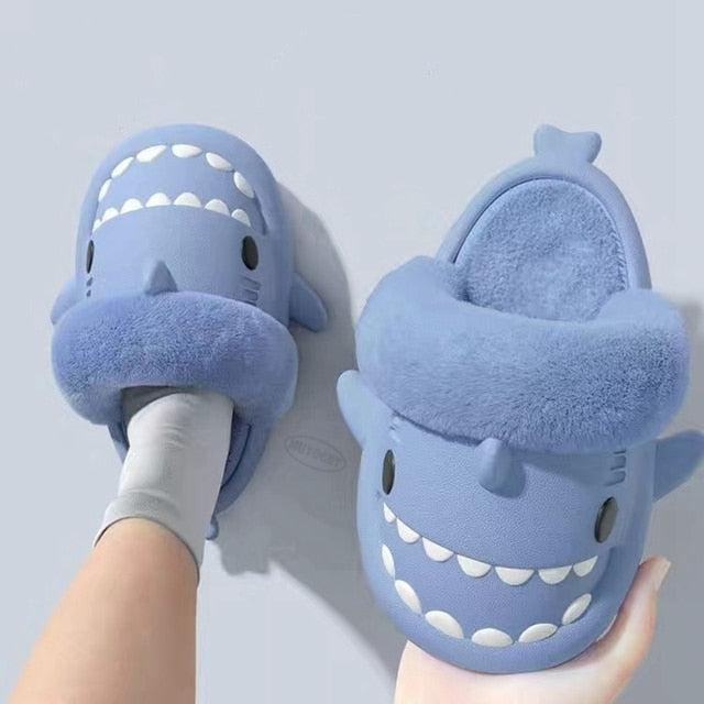 Non-Slip Furry Shark Slides Introducing the Non-Slip Furry Shark Slides – the perfect footwear for any occasion! These slippers are made from waterproof materials and boast non-slip soles, making them ideal for use both indoors and outdoors. Crafted with