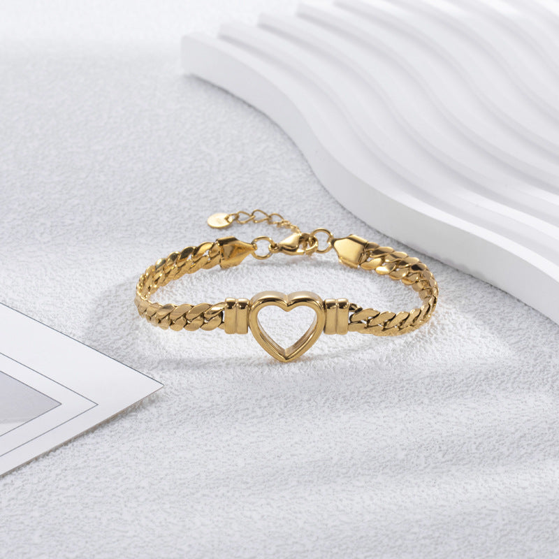 Fashion Simple Hollow Heart Titanium Steel Bracelet Product information: Treatment Process: Electroplating Color: BR-26 Gold, BR-26 Silver Applicable people: Unisex Material: titanium steel Shape: heart shape Packing list: 1* Bracelet Product Image: Fashi