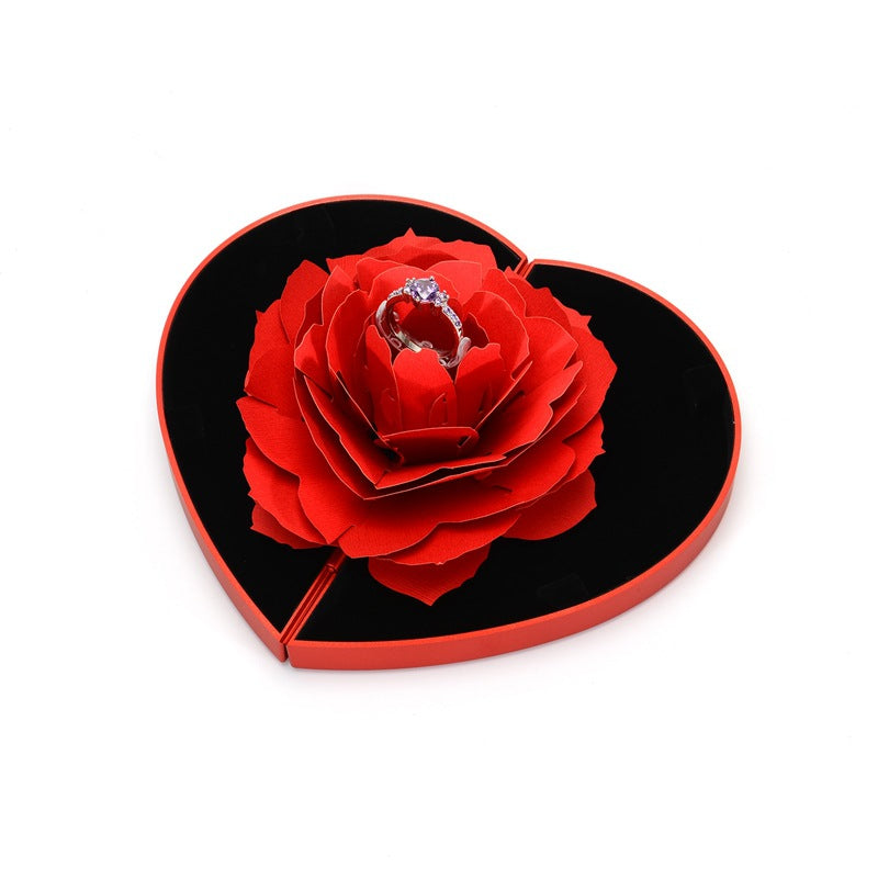 3D Love Box Heart-shaped Rose Flower Rotating Ring Box Valentines Day Gift It's just a box! You need buy a ring if you want more! Overview: Unique design, stylish and beautiful. Good material to use. A variety of colors, more choice. Product Details: Mate