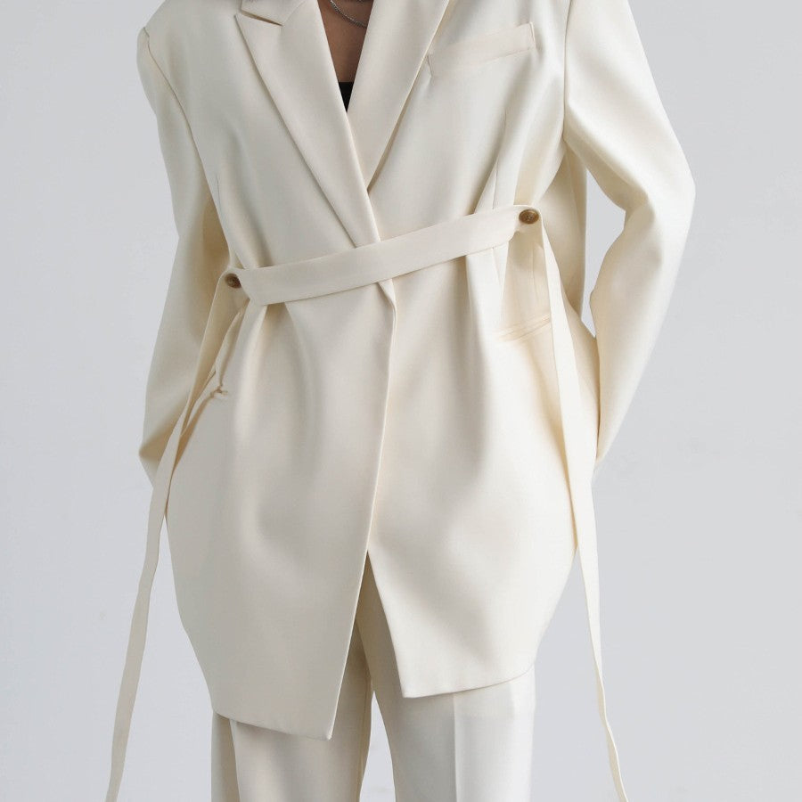 Mid-length Draped Blazer With Flutter StrapsWomen's Suits Product information: Material: Polyester Style: Princess Style Colour: Black jacket, white jacket, black set, white set Size Information: Size: S/M/L/XL Packing list: Jacket*1/ Jacket*1 Trousers*1