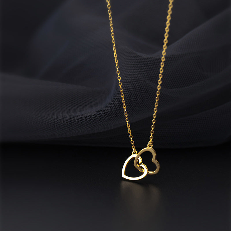 Double Heart Interlocking Titanium Steel Necklace Jewelry Overview: 100% new design and high quality Must-have for fashion women Have a beautiful appearance Specifications: Material: titanium steel Treatment process: electroplating Type: necklace Style: W