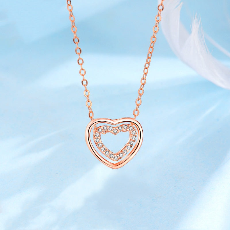 S925 Sterling Silver Heart To Heart Pendant Necklace Product information: Treatment Process: Electroplating Color: XL0320 heart-to-heart necklace (white gold color),XL0320 heart-to-heart necklace (Rose Gold) Pendant material: 925 silver Chain style: cross