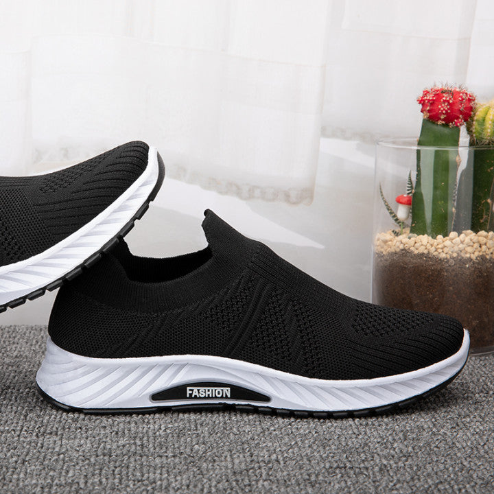 Mesh Breathable Fly Knit Sneaker Soft Sole Product information : Heel shape: flat heel Inner material: mesh cloth Opening depth: shallow mouth (below 7cm) Upper height: low upper Toe shape: round head Heel height: flat heel Color: blue, black, gray Size I