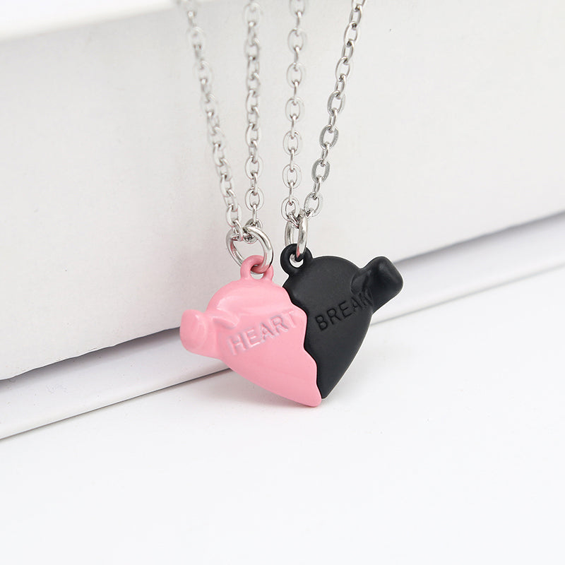 Holding Heart Magnet Pendant Couple Necklace For Love Product Information: Material: Mixed material Processing process: handmade Shape: Heart shape Chain pattern: cross chain Layer or not: No Pendant material: Alloy Popular element: Hearts/hearts Style: C