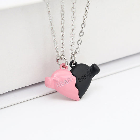 Holding Heart Magnet Pendant Couple Necklace For Love Product Information: Material: Mixed material Processing process: handmade Shape: Heart shape Chain pattern: cross chain Layer or not: No Pendant material: Alloy Popular element: Hearts/hearts Style: C