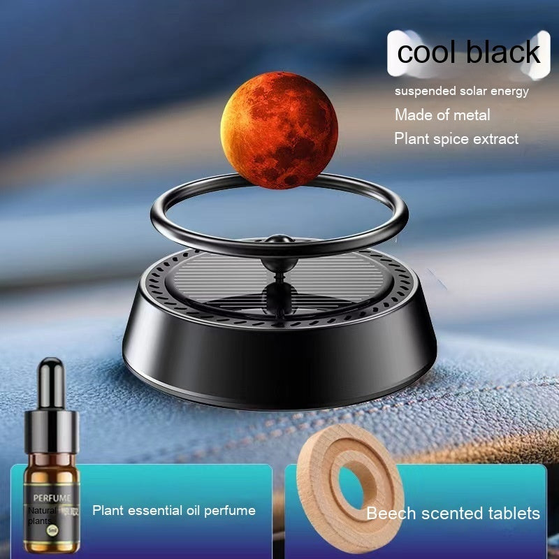 Solar Energy Rotating Car Aromatherapy Aluminum Alloy Car Interior Decoration Ornament Product information: Name: Floating planet Material: alumimum, zinc alloy, solid wood Size: 8.3*8 * 8cm Ingredients: plant sesame oil Jasmine Scented Green tea: Beech S