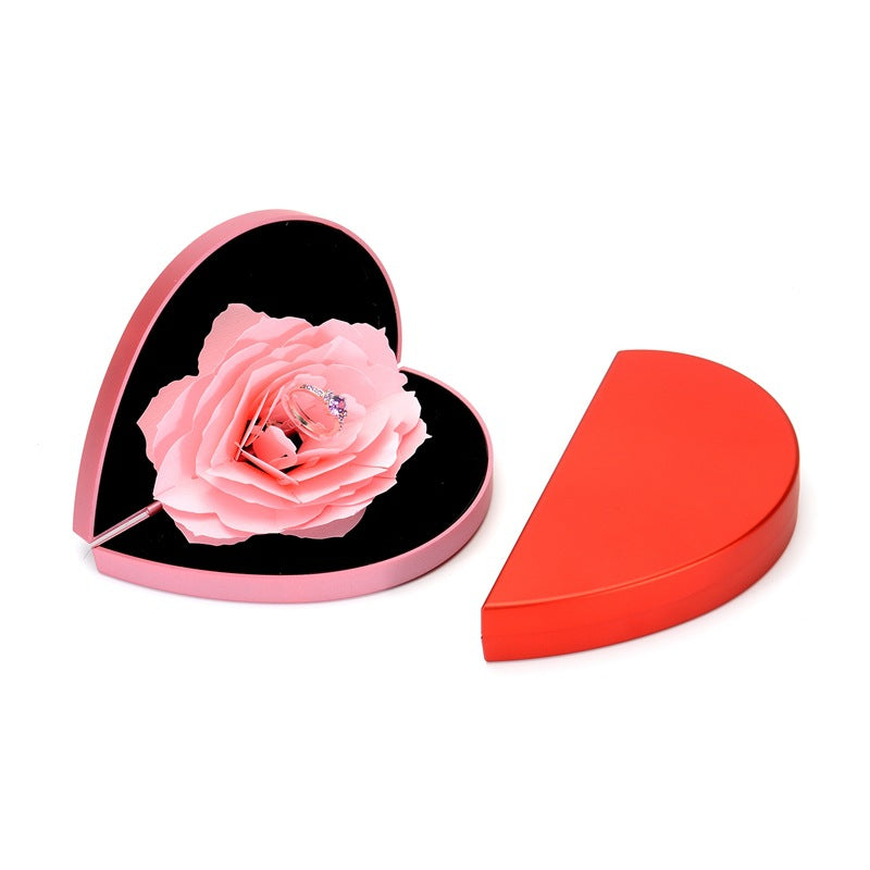 3D Love Box Heart-shaped Rose Flower Rotating Ring Box Valentines Day Gift It's just a box! You need buy a ring if you want more! Overview: Unique design, stylish and beautiful. Good material to use. A variety of colors, more choice. Product Details: Mate