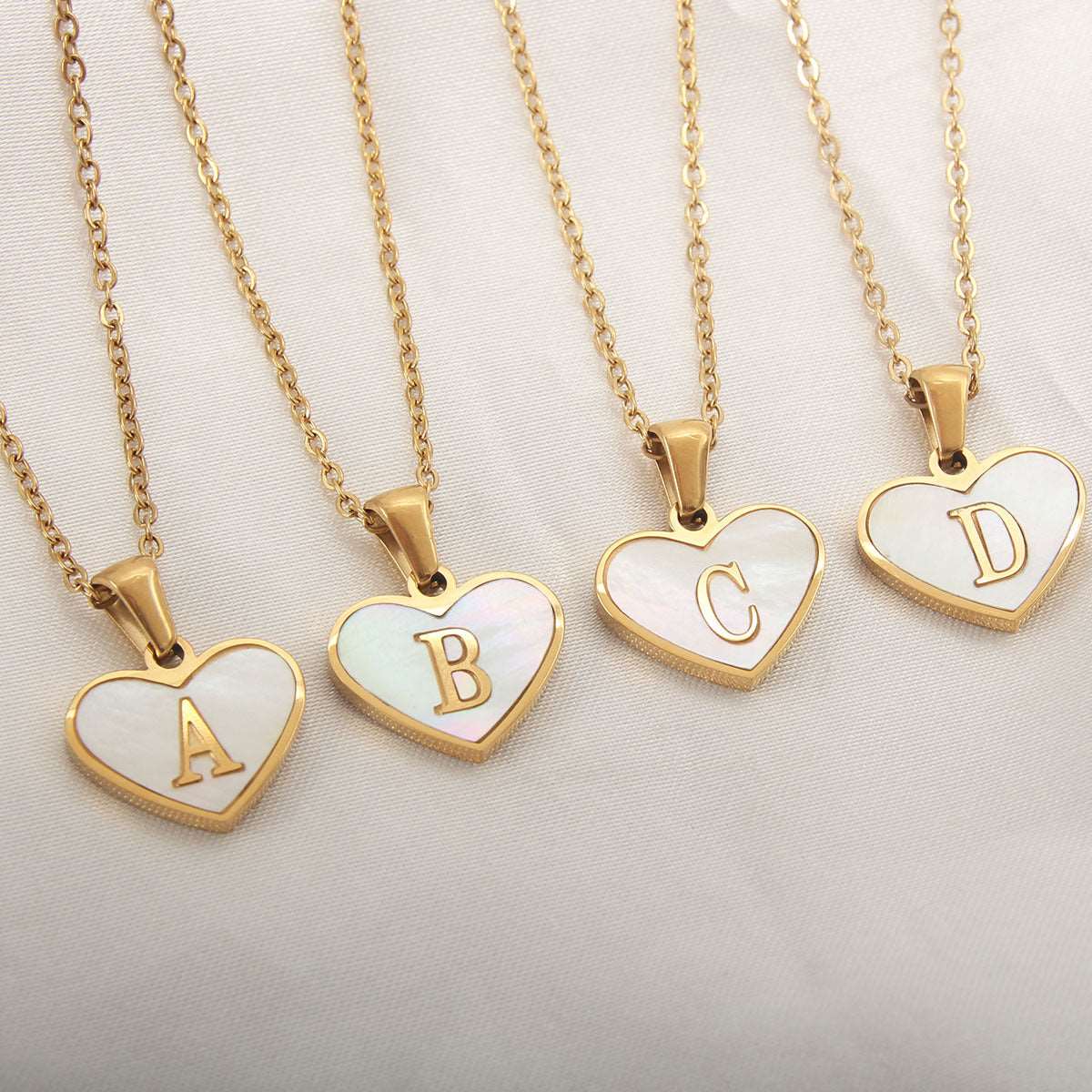 26 Letter Heart-shaped Necklace White Shell Love Clavicle Chain Fashion Personalized Necklace For Women Jewelry Valentine's Day Overview: Unique design, stylish and beautiful. Good material, comfortable wear. A variety of colors, any choice. Product infor