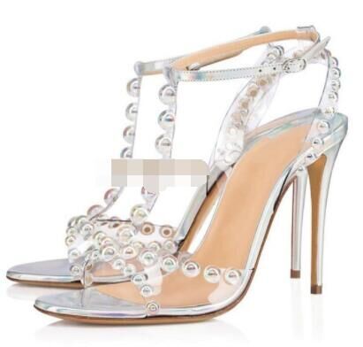 Transparent PVC Colorful Round Beads T-strap Thin High-heeled Sandals Product Information: Closure: one foot stirrup Pattern: color blocking Gang material: resin Style: one-piece buckle belt Color classification: transparent 7 color beads transparent dazz