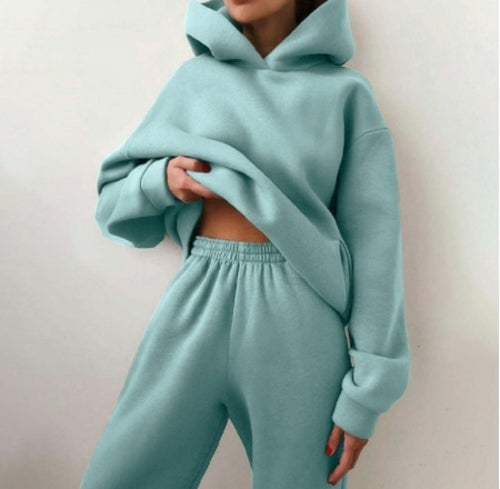 Essential Winter Hoodie Sweat Set Introducing the Essential Winter Hoodie Sweat Set, the perfect ensemble to keep you cozy and stylish during the colder months. This set includes a comfortable hoodie and matching sweatpants, offering a complete outfit for