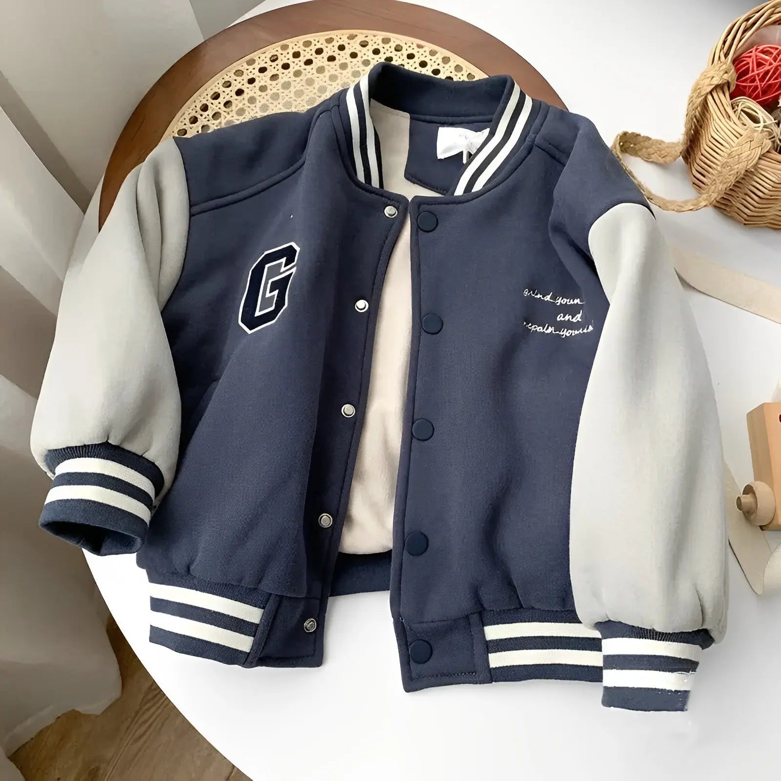 Kinder College Jacket Are you looking for a stylish baby clothing item that will give your little ones an extra layer of warmth? Then you should check out our Kinder College Jackets! These high-quality jackets are exquisitely made with neatly finished sea