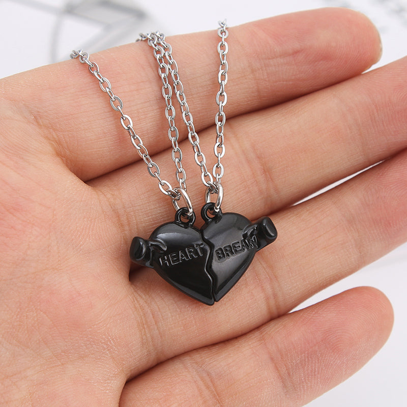 Holding Heart Magnet Pendant Couple Necklace For Love Product Information: Material: Mixed material Processing process: handmade Shape: Heart shape Chain pattern: cross chain Layer or not: No Pendant material: Alloy Popular element: Hearts/hearts Style: C