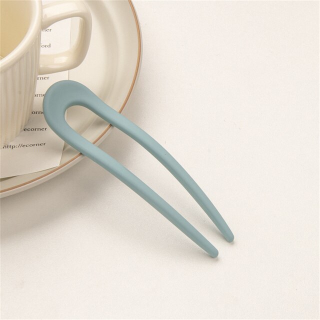 Fashion Candy Color Hair Sticks for Women Elevate your hair game with our Fashion Candy Color Hair Sticks for Women. These Simple Hair Clip Pins come in a variety of vibrant candy colors, adding a playful touch to your hairstyles. Crafted with a minimalis