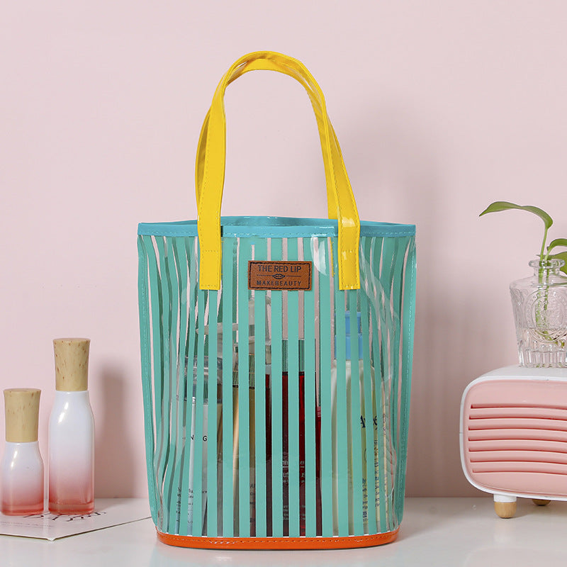 Striped Handbag Wash Bag Girl Heart Transparent Portable Large Capacity Product information: Applicable scenarios: Travel storage, makeup storage Color: white, green, black, orange Scope of Application: sprinkling Xi travel Function: Car Material: PVC Sty