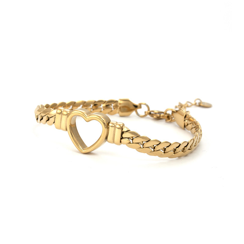 Fashion Simple Hollow Heart Titanium Steel Bracelet Product information: Treatment Process: Electroplating Color: BR-26 Gold, BR-26 Silver Applicable people: Unisex Material: titanium steel Shape: heart shape Packing list: 1* Bracelet Product Image: Fashi