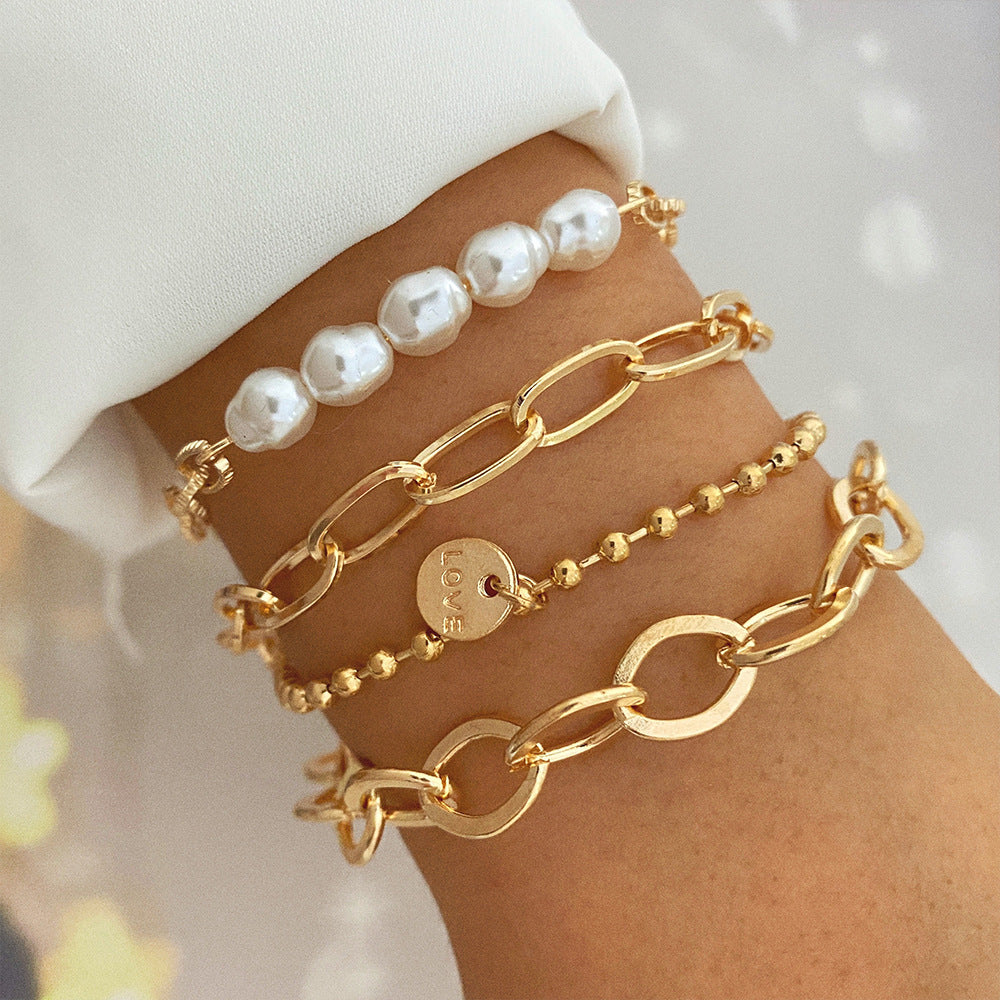 Creative Heart Pearl Multi-layer Chain OT Bracelet Suit Product information: Treatment Process: Electroplating Color: HS533-1,HS533-2,HS533-3,HS533-4 Applicable people: Unisex Applicable occasions for gifts: Employee Benefits Material: Alloy Shape: Star P
