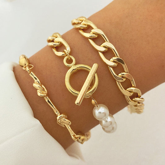 Creative Heart Pearl Multi-layer Chain OT Bracelet Suit Product information: Treatment Process: Electroplating Color: HS533-1,HS533-2,HS533-3,HS533-4 Applicable people: Unisex Applicable occasions for gifts: Employee Benefits Material: Alloy Shape: Star P