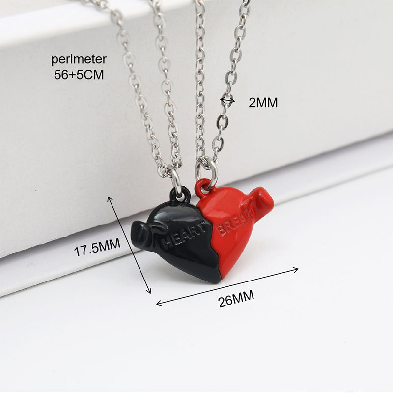 Holding Heart Magnet Pendant Couple Necklace For Love Product Information: Material: Mixed material Processing process: handmade Shape: Heart shape Chain pattern: cross chain Layer or not: No Pendant material: Alloy Popular element: Hearts/hearts Style: C