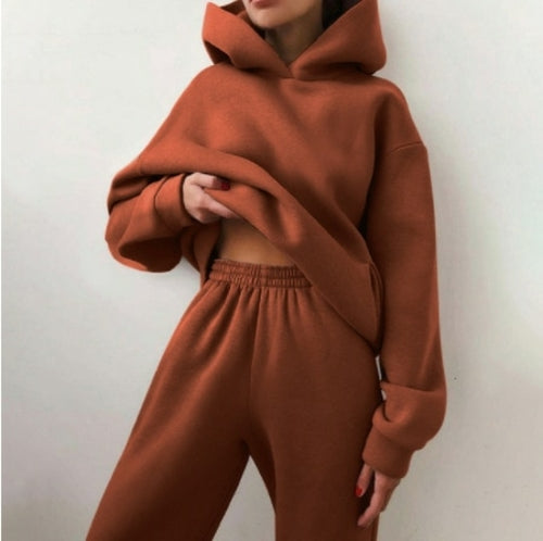 Essential Winter Hoodie Sweat Set Introducing the Essential Winter Hoodie Sweat Set, the perfect ensemble to keep you cozy and stylish during the colder months. This set includes a comfortable hoodie and matching sweatpants, offering a complete outfit for