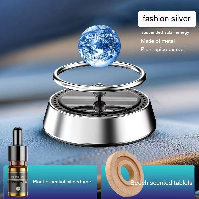 Solar Energy Rotating Car Aromatherapy Aluminum Alloy Car Interior Decoration Ornament Product information: Name: Floating planet Material: alumimum, zinc alloy, solid wood Size: 8.3*8 * 8cm Ingredients: plant sesame oil Jasmine Scented Green tea: Beech S