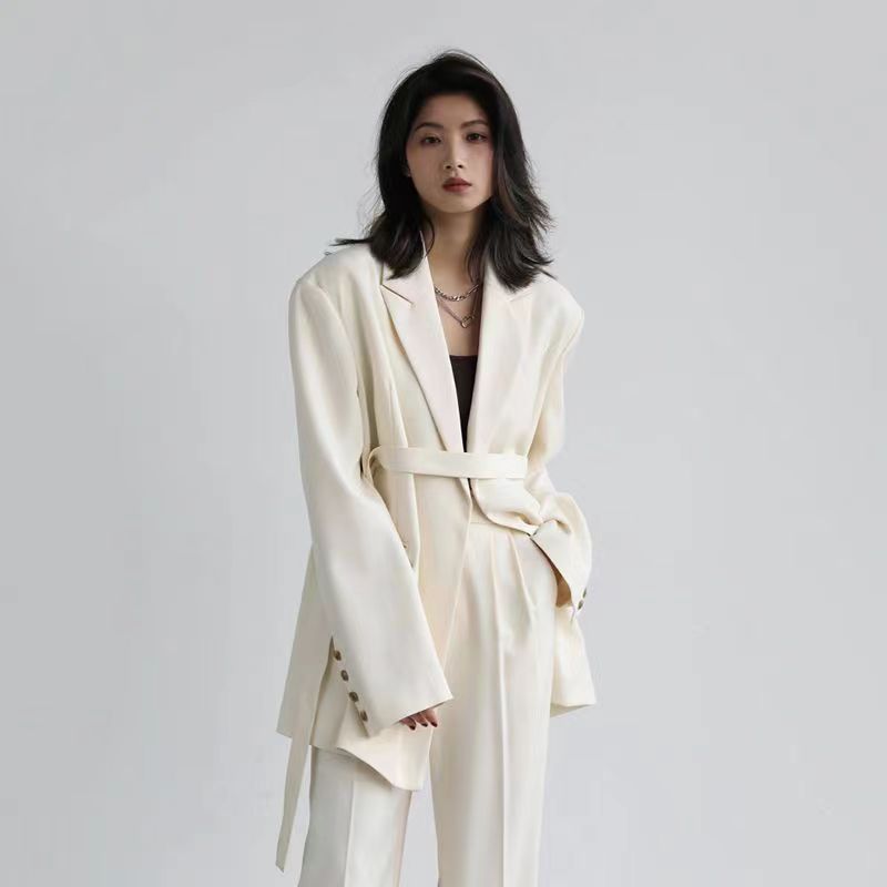Mid-length Draped Blazer With Flutter StrapsWomen's Suits Product information: Material: Polyester Style: Princess Style Colour: Black jacket, white jacket, black set, white set Size Information: Size: S/M/L/XL Packing list: Jacket*1/ Jacket*1 Trousers*1
