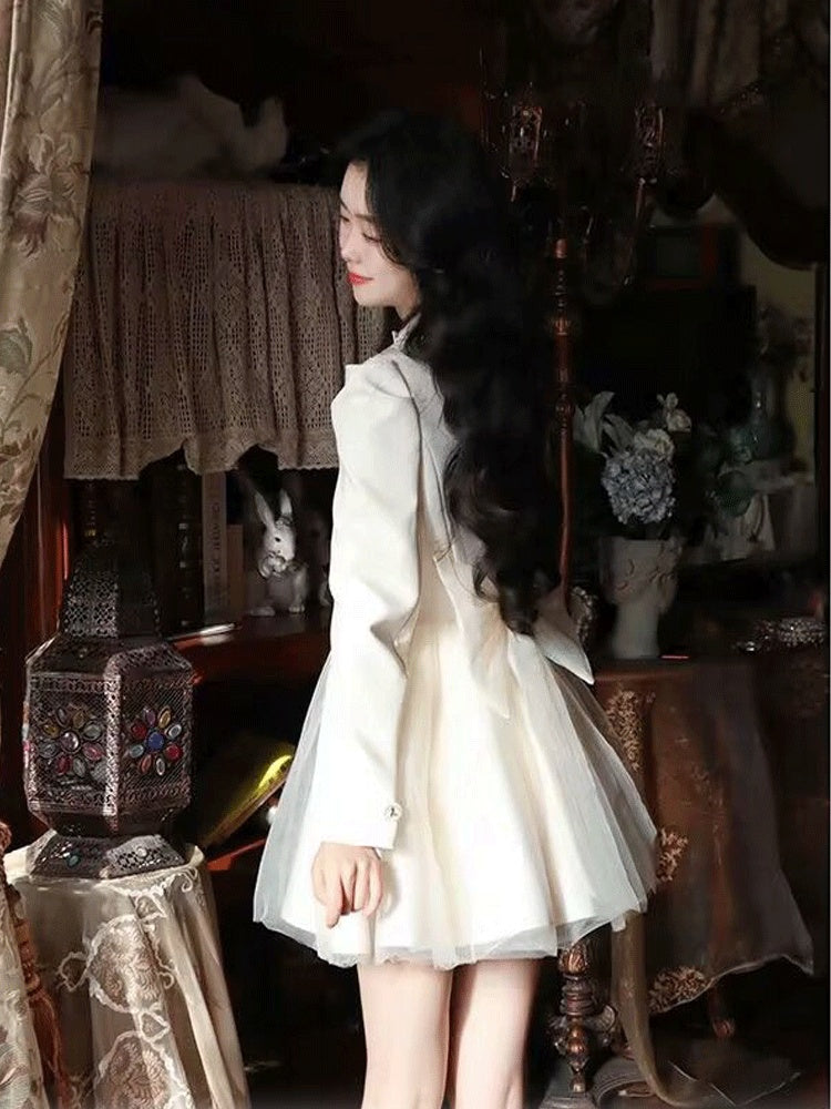 Pengpeng White Suit Dress Waist Up Fairy Short Skirt Product Information: Fabric name: Chemical fiber/polyester Craft: Solid color, buttons, pleats, mesh stitching Style: A-line skirt, fluffy skirt Combination form: single piece Skirt length: medium lengt