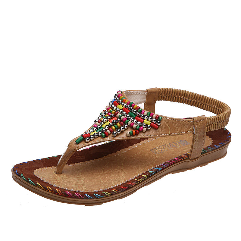 Beach Flip Toe Beaded Flat Sandals Product information: Pattern: solid color Lining material: imitation leather Color: beige, brown Upper height: low top Size: 36, 37, 38, 39, 40, 41, 42, 43 Sole craft: viscose shoes Sole material: rubber Popular elements