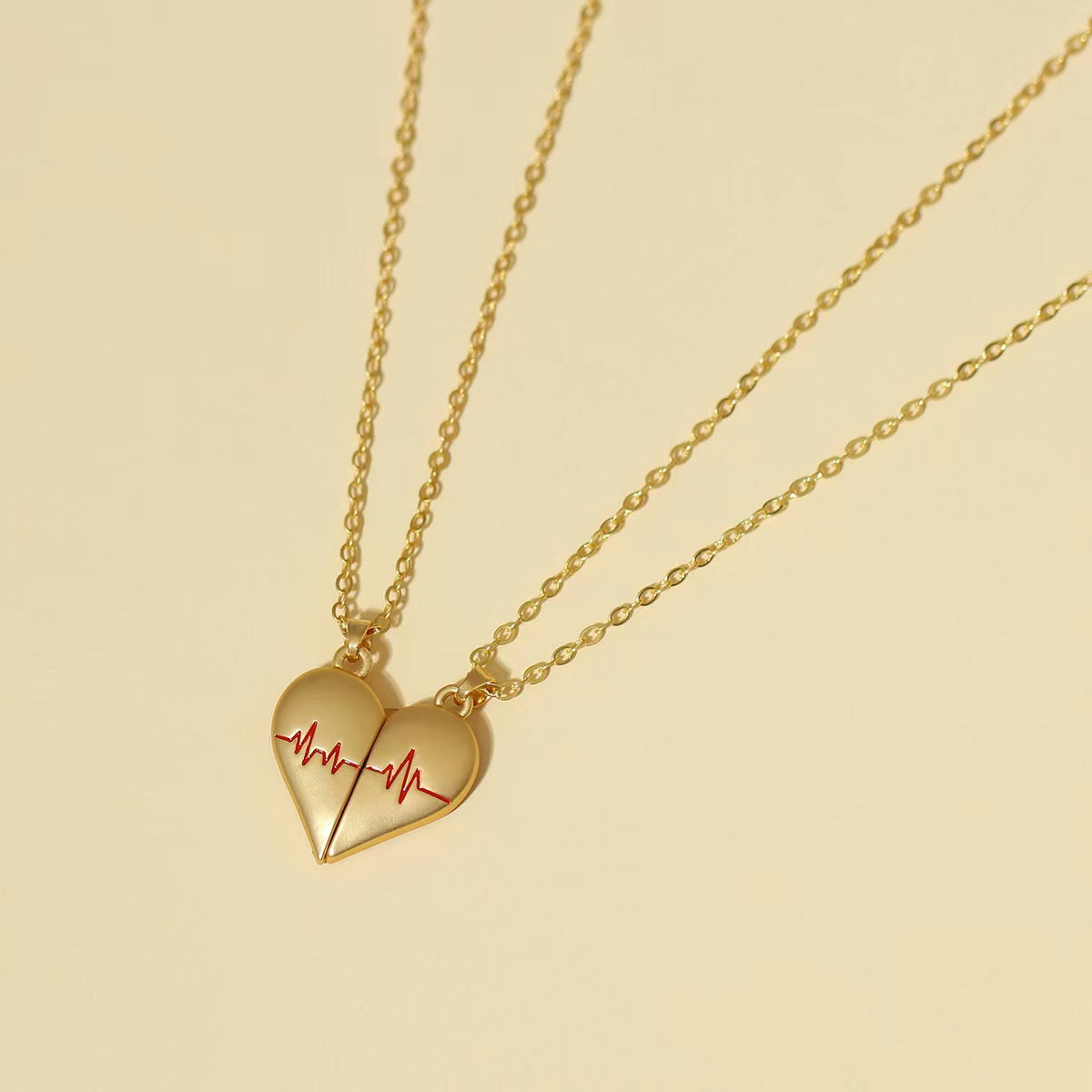 Heartbeat Magnetic Heart Necklace Love Couple Jewelry Product information : Material: alloy Treatment: electroplating Style: magnet necklace Modeling: geometric Chain style: regular chain Multilayer: No. Circumference: 21-50cm Color: gold pair, silver pai