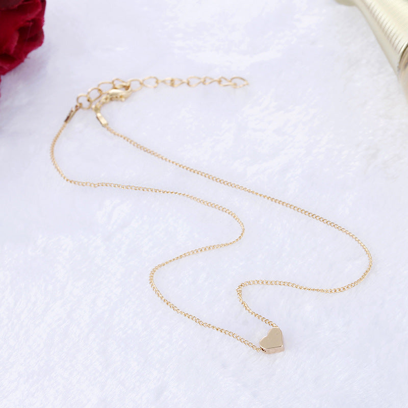 Simple Fashion Gold Color Double-sided Love Pendant Necklaces Clavicle Chains Necklace Women Jewelry Valentines Day Gift Overview: Stylish design coordinates with a suit, sportswear, workwear, fitness, daily clothing on most occasions. Try to match your d