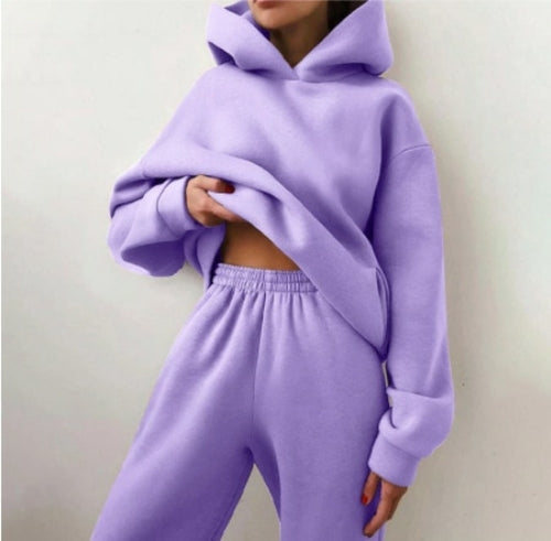 Essential Winter Hoodie Sweat Set Introducing the Essential Winter Hoodie Sweat Set, the perfect ensemble to keep you cozy and stylish during the colder months. This set includes a comfortable hoodie and matching sweatpants, offering a complete outfit for