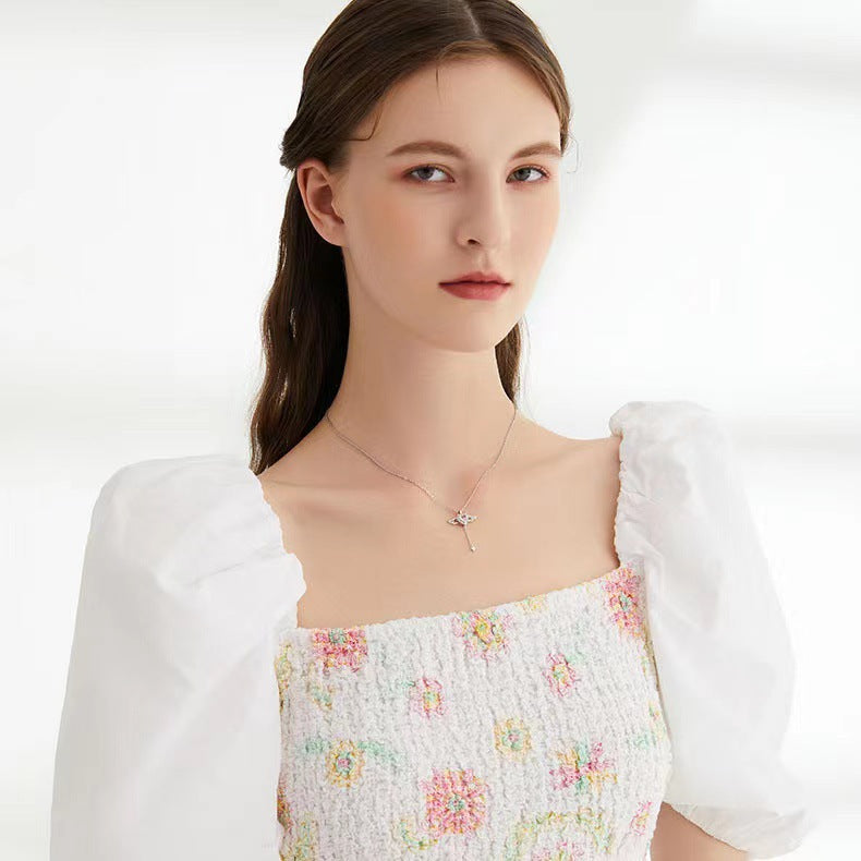 Cupid Heart Angel Wings Tassel Necklace Clavicle Chain Product information: Treatment Process: Electroplating Color: BT007 wing fly silver Cupid, BT025 wing fly gold Cupid Chain style: O-shaped necklace Material: titanium steel Shape: heart shape Circumfe