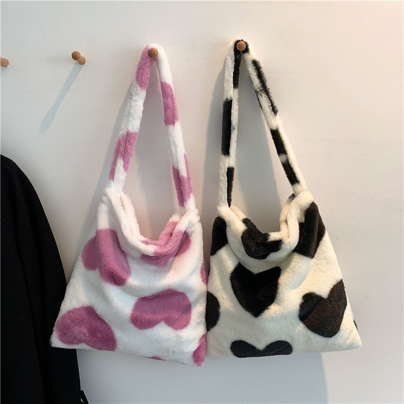 Love Heart Shoulder Bags Winter Plush Shopping Bags For Women Product information: Material: plush Luggage trend style: bucket bag Bag size: large Fashion element: plush Lining texture: no lining Bag shape: vertical square Cover opening mode: adhesive clo