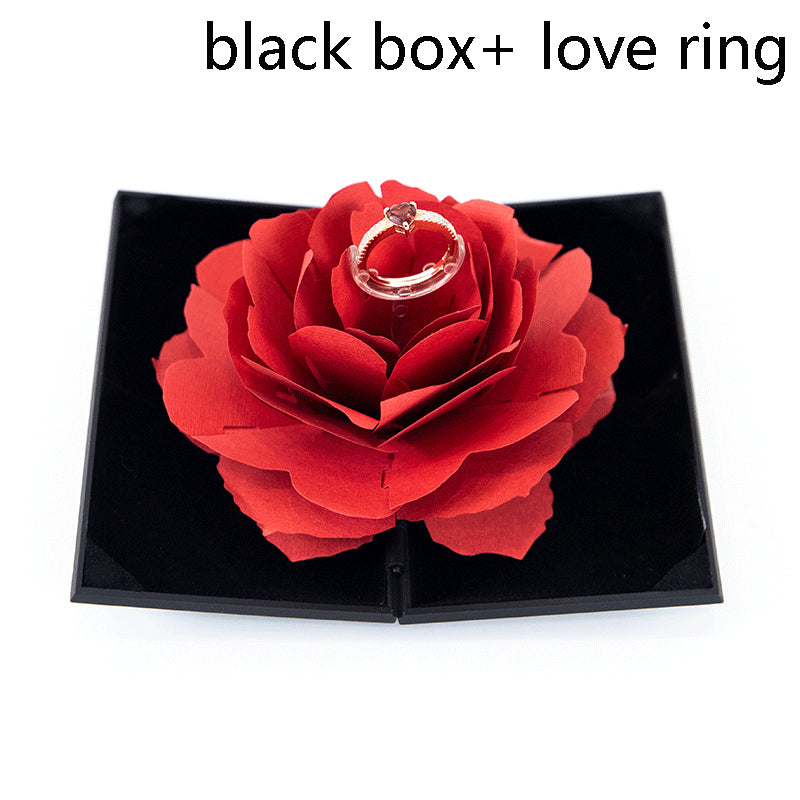 3D Love Box Heart-shaped Rose Flower Rotating Ring Box Valentines Day Gift It's just a box! You need buy a ring if you want more! Overview: Unique design, stylish and beautiful. Good material to use. A variety of colors, more choice. Product Details: Mate