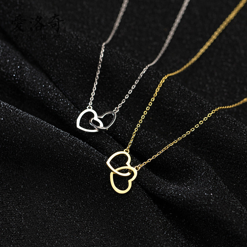 Double Heart Interlocking Titanium Steel Necklace Jewelry Overview: 100% new design and high quality Must-have for fashion women Have a beautiful appearance Specifications: Material: titanium steel Treatment process: electroplating Type: necklace Style: W