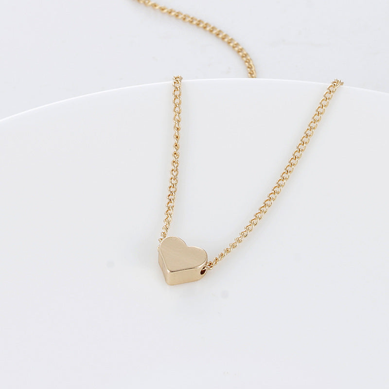 Simple Fashion Gold Color Double-sided Love Pendant Necklaces Clavicle Chains Necklace Women Jewelry Valentines Day Gift Overview: Stylish design coordinates with a suit, sportswear, workwear, fitness, daily clothing on most occasions. Try to match your d
