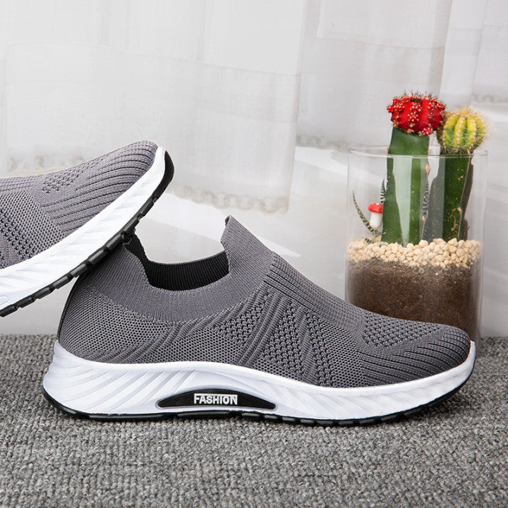Mesh Breathable Fly Knit Sneaker Soft Sole Product information : Heel shape: flat heel Inner material: mesh cloth Opening depth: shallow mouth (below 7cm) Upper height: low upper Toe shape: round head Heel height: flat heel Color: blue, black, gray Size I