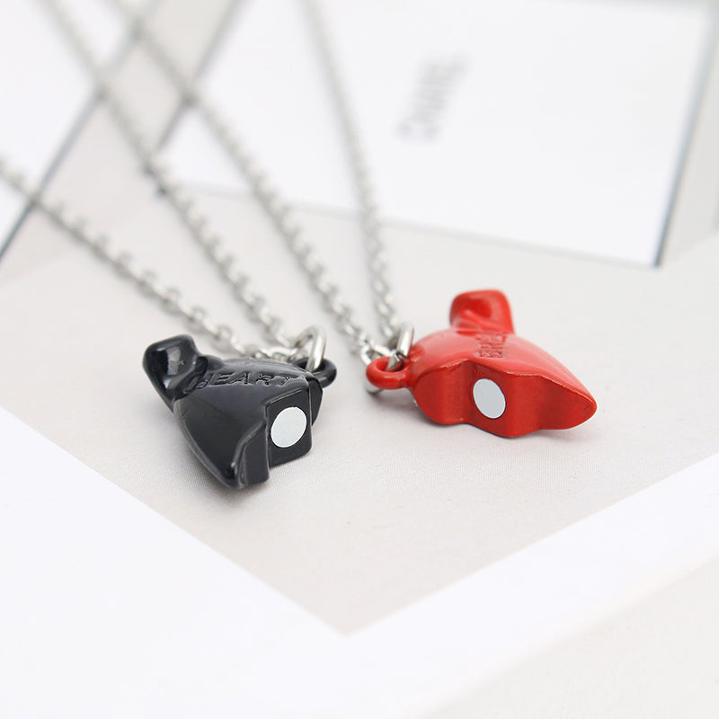 Holding Heart Magnet Pendant Couple Necklace For Love Product Information: Material: Mixed material Processing process: handmade Shape: Heart shape Chain pattern: cross chain Layer or not: No Pendant material: Alloy Popular element: Hearts/hearts Style: C
