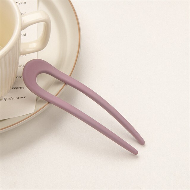 Fashion Candy Color Hair Sticks for Women Elevate your hair game with our Fashion Candy Color Hair Sticks for Women. These Simple Hair Clip Pins come in a variety of vibrant candy colors, adding a playful touch to your hairstyles. Crafted with a minimalis