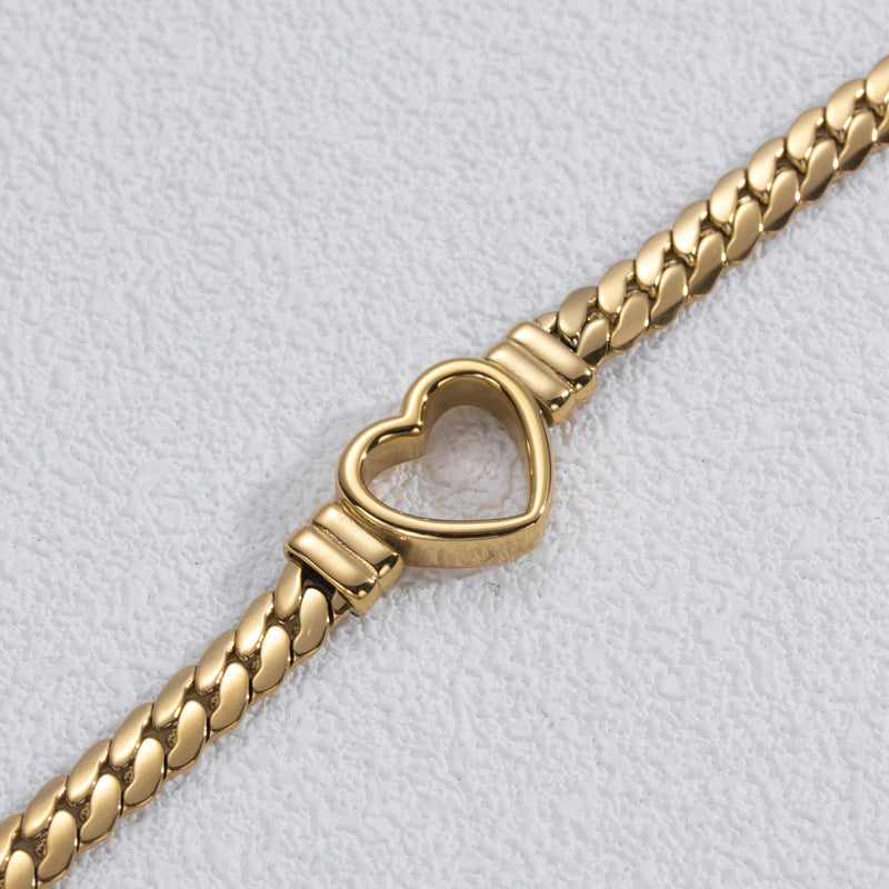 Fashion Simple Hollow Heart Titanium Steel Bracelet Product information: Treatment Process: Electroplating Color: BR-26 Gold, BR-26 Silver Applicable people: Unisex Material: titanium steel Shape: heart shape Packing list: 1* Bracelet Product Image: Fashi