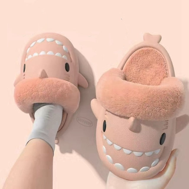 Non-Slip Furry Shark Slides Introducing the Non-Slip Furry Shark Slides – the perfect footwear for any occasion! These slippers are made from waterproof materials and boast non-slip soles, making them ideal for use both indoors and outdoors. Crafted with