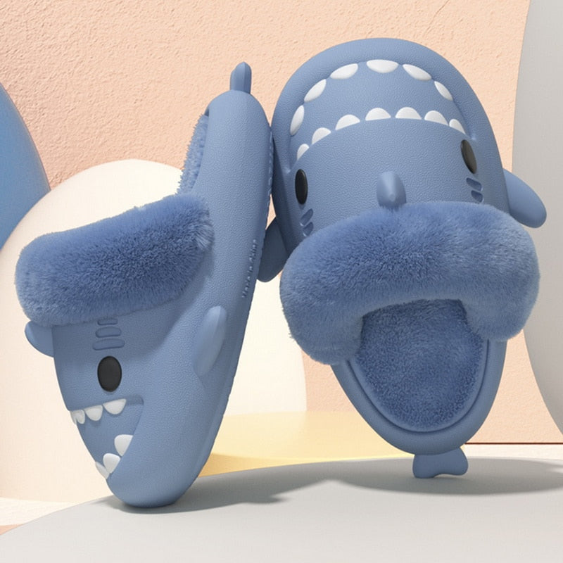 Non-Slip Furry Shark Slides Introducing the Non-Slip Furry Shark Slides – the perfect footwear for any occasion! These slippers are made from waterproof materials and boast non-slip soles, making them ideal for use both indoors and outdoors. Crafted with
