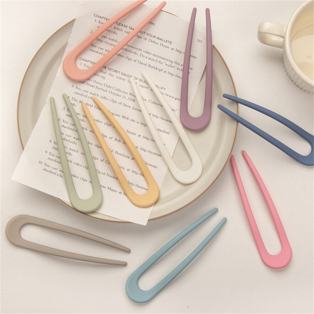 Fashion Candy Color Hair Sticks for Women Elevate your hair game with our Fashion Candy Color Hair Sticks for Women. These Simple Hair Clip Pins come in a variety of vibrant candy colors, adding a playful touch to your hairstyles. Crafted with a minimalis