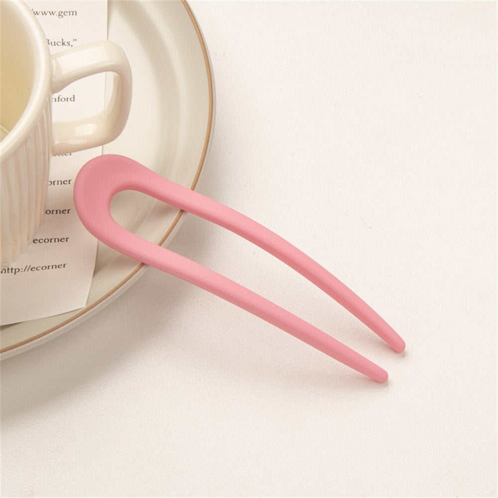 Fashion Candy Color Hair Sticks for Women Elevate your hair game with our Fashion Candy Color Hair Sticks for Women. These Simple Hair Clip Pins come in a variety of vibrant candy colors, adding a playful touch to your hairstyles. Crafted with a minimalis