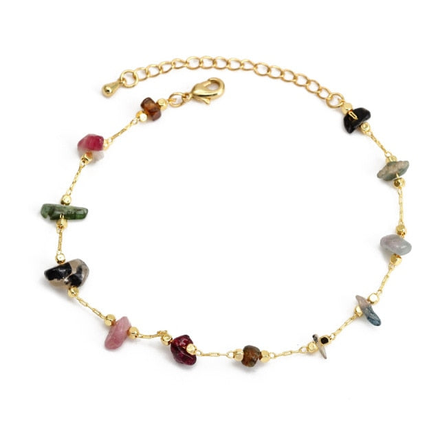 Charm Bracelet Introducing the Charm Bracelet! This beautiful bracelet is made of high quality materials, including copper, pearls, and natural stones. It's the perfect accessory to add a touch of elegance to any outfit. The Charm Bracelet is also a great